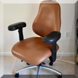 F44. Neutral Posture Inc adjustable leather desk chair. Model NPS8870. 48”h